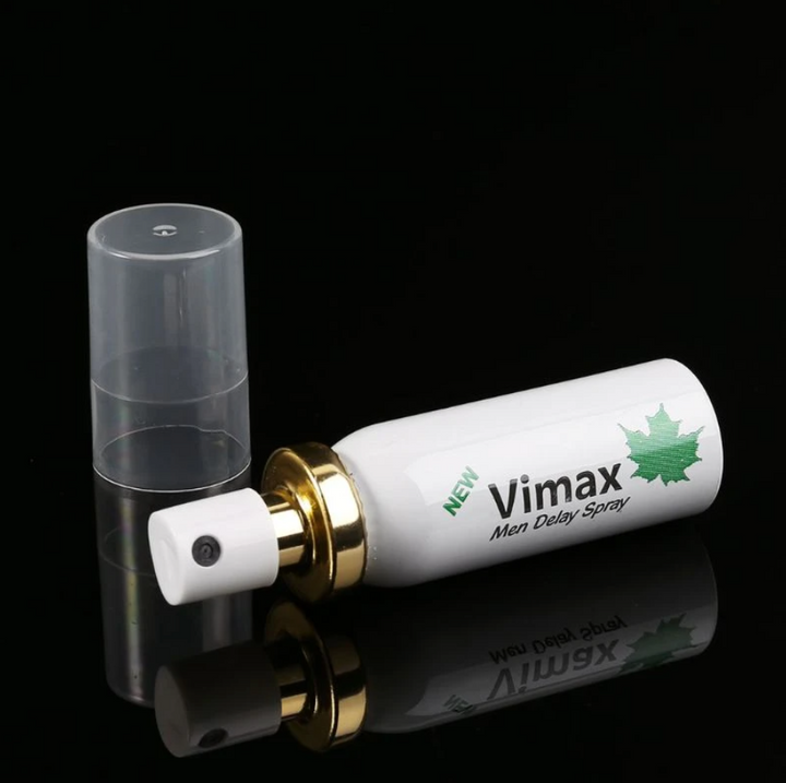 Vimax Men's Delay Spray Bottle and Top (sideways on table)